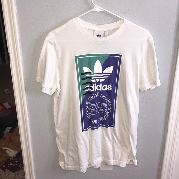 adidas the brand with the 3 stripes shirt